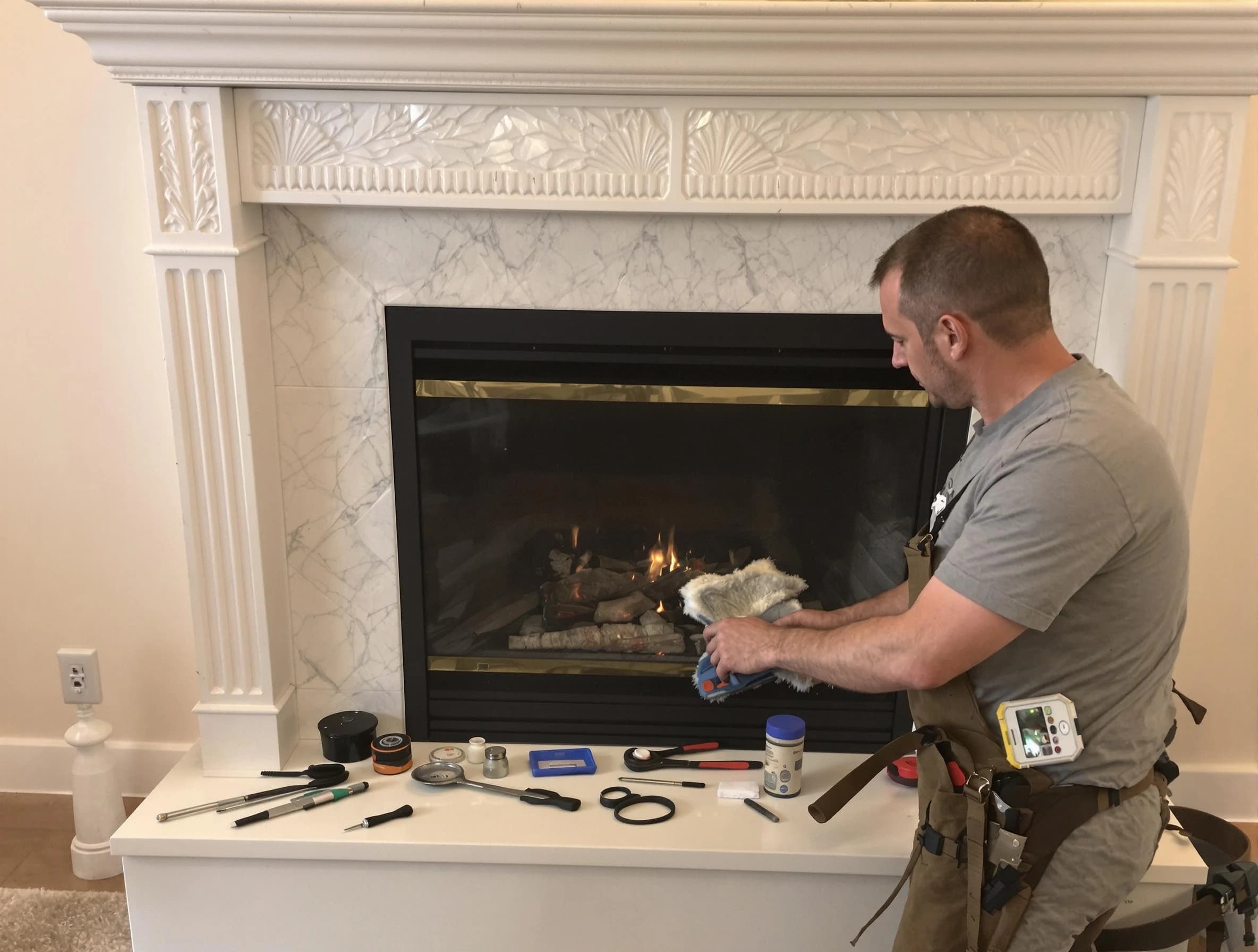 Worcester Chimney Sweep performing fireplace maintenance in Worcester, MA